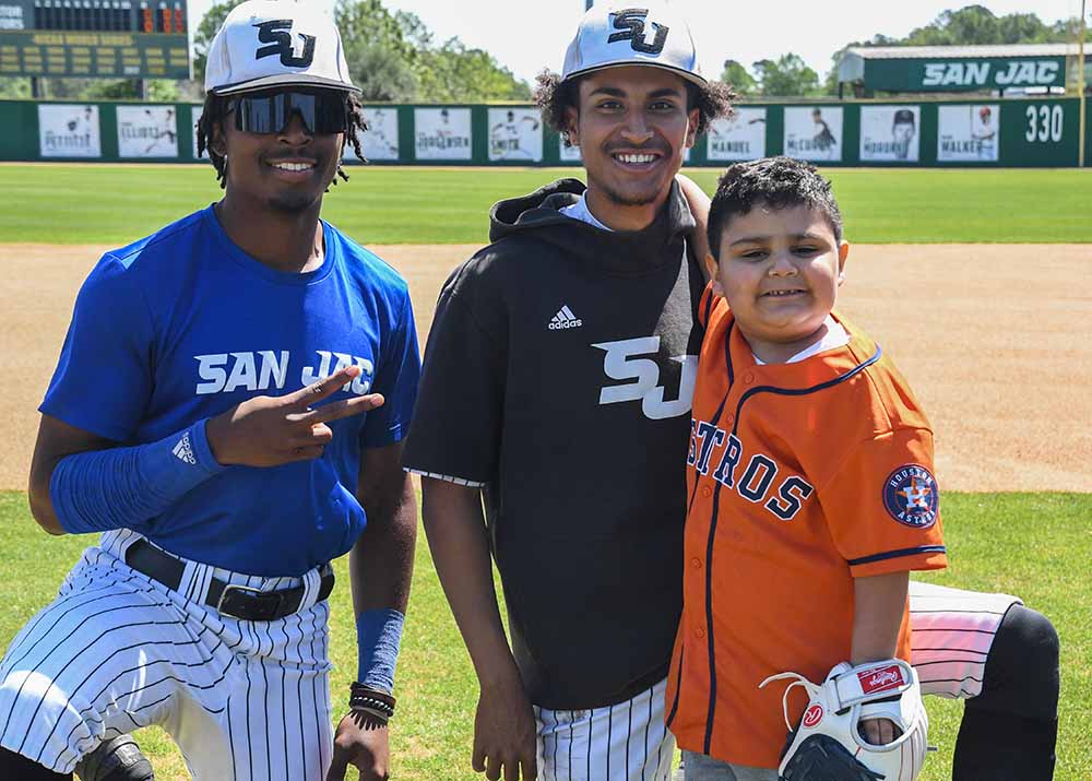 baseball players and fan