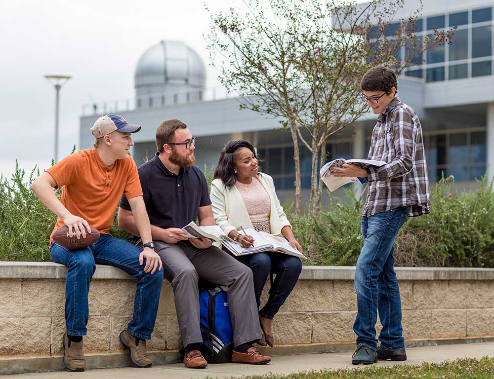 Social and Behavioral Sciences students studying outside