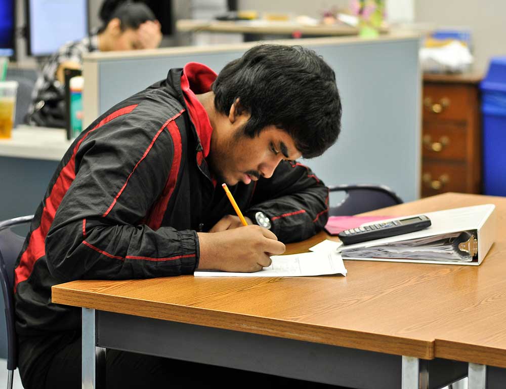 Student studying at the Student Success Center